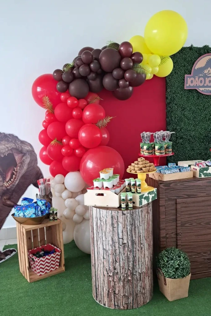 T-Rex Snack Station with Bold Balloon Arch