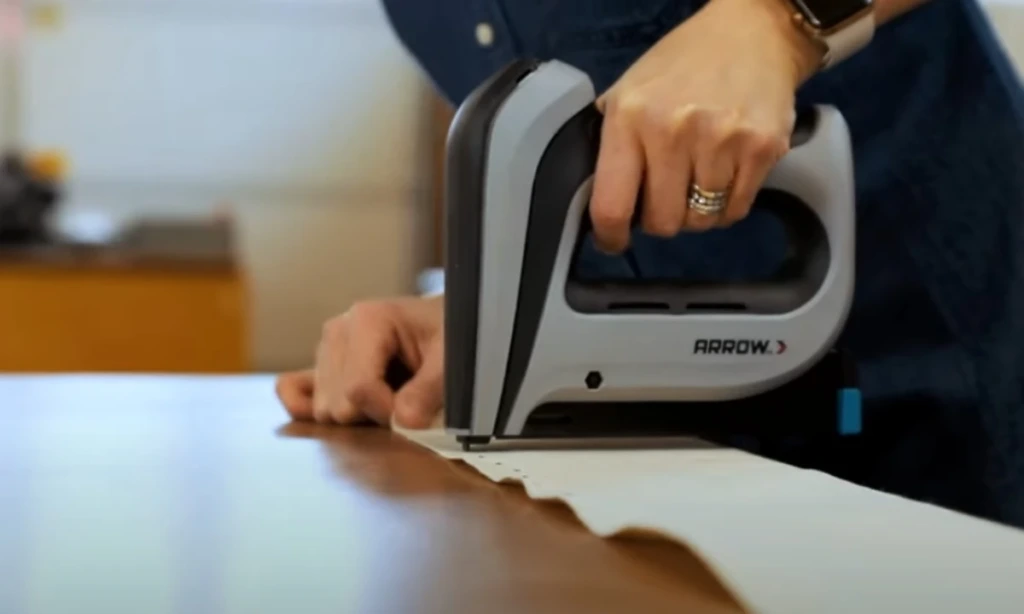 Start stapling the long sides