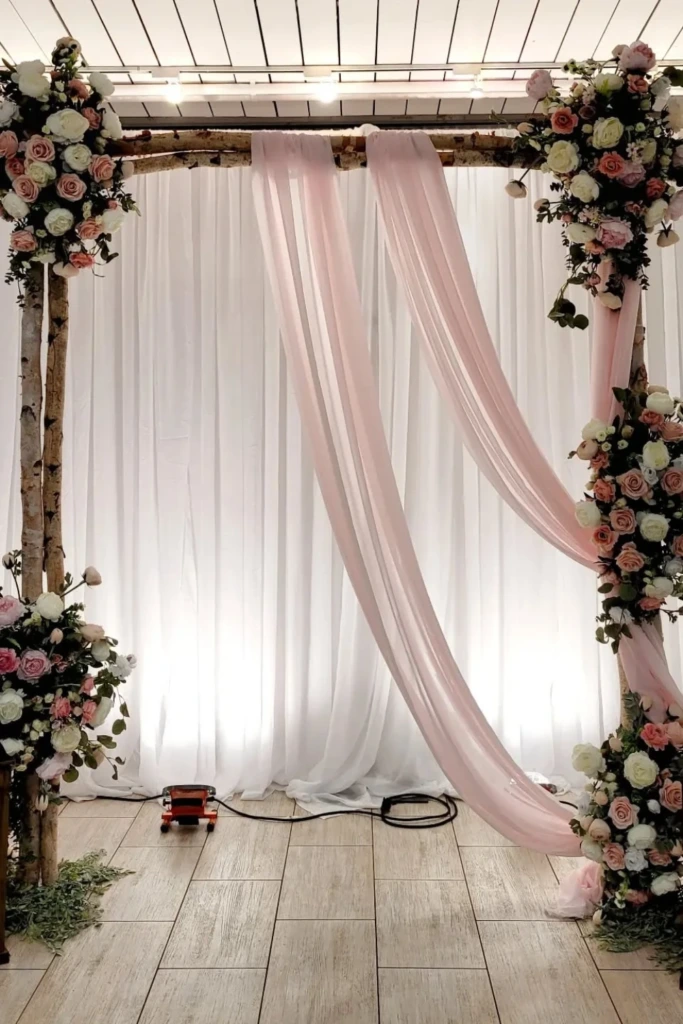 Romantic Birchwood Arch with Soft Drapes