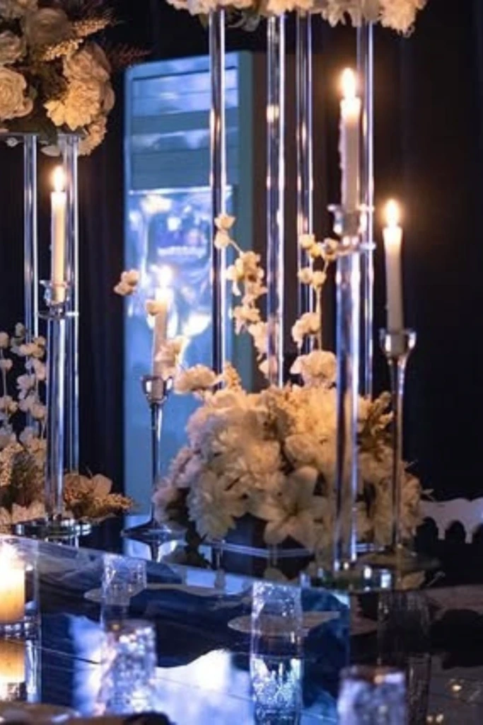 Candlelit Dinner Table with Tall Floral Stands