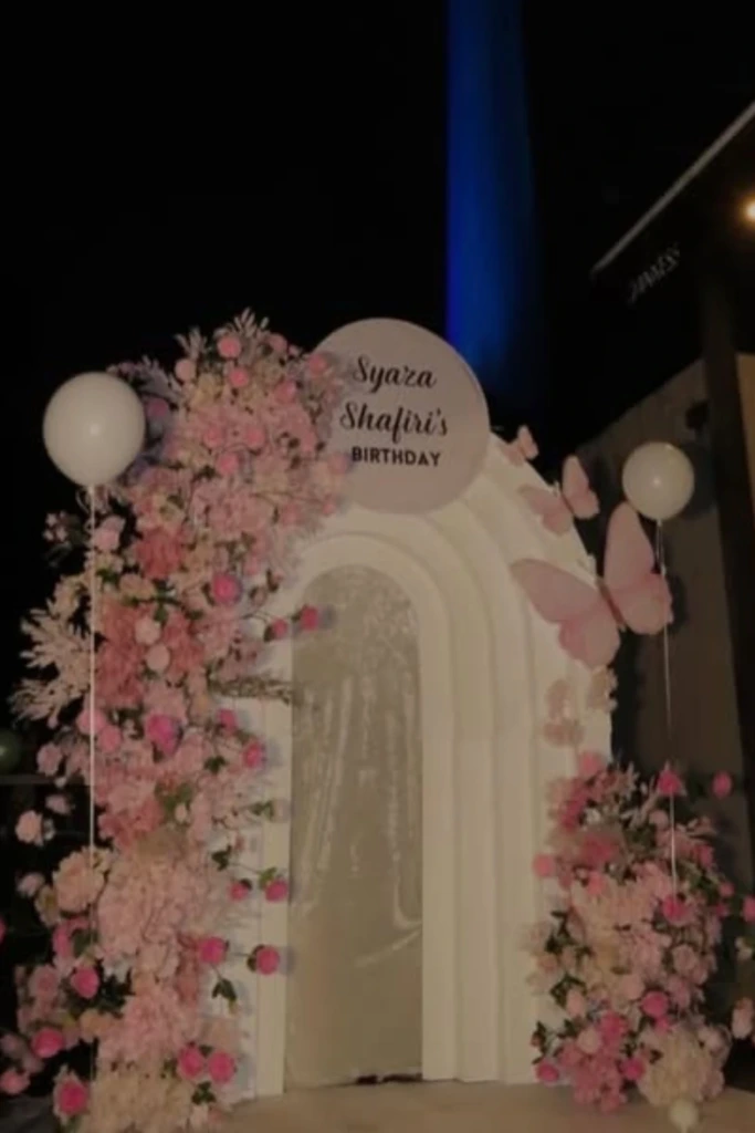 Floral Archway Entrance with Butterfly Touches