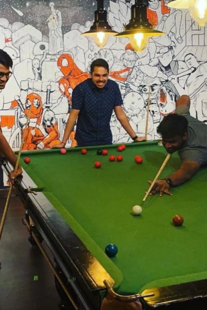 Pool Table Fun Under Pendant Lights