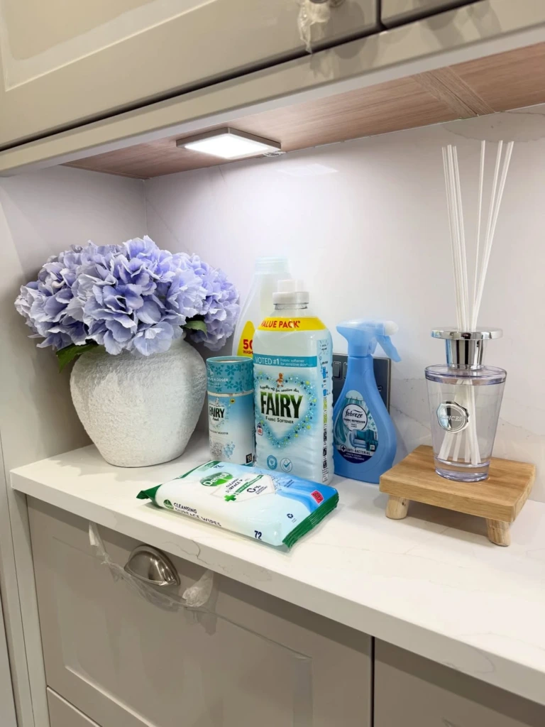 1. Styled Detergent Vignette with Hydrangeas and Diffuser