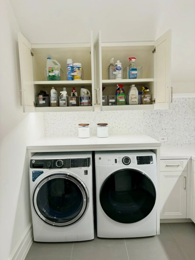 8. Bright Laundry Room with Acrylic Bin Cabinet Organization