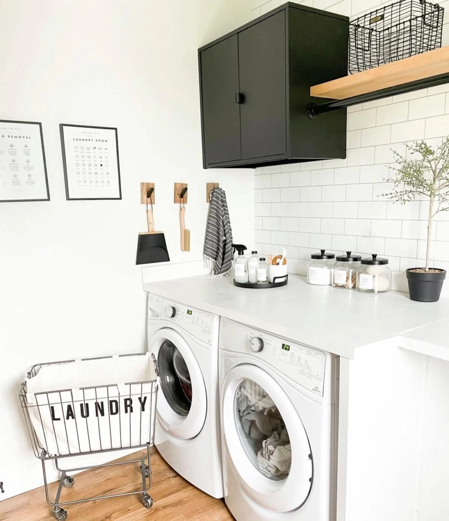 9. Modern Farmhouse Laundry with Glass Apothecary Jar Trio