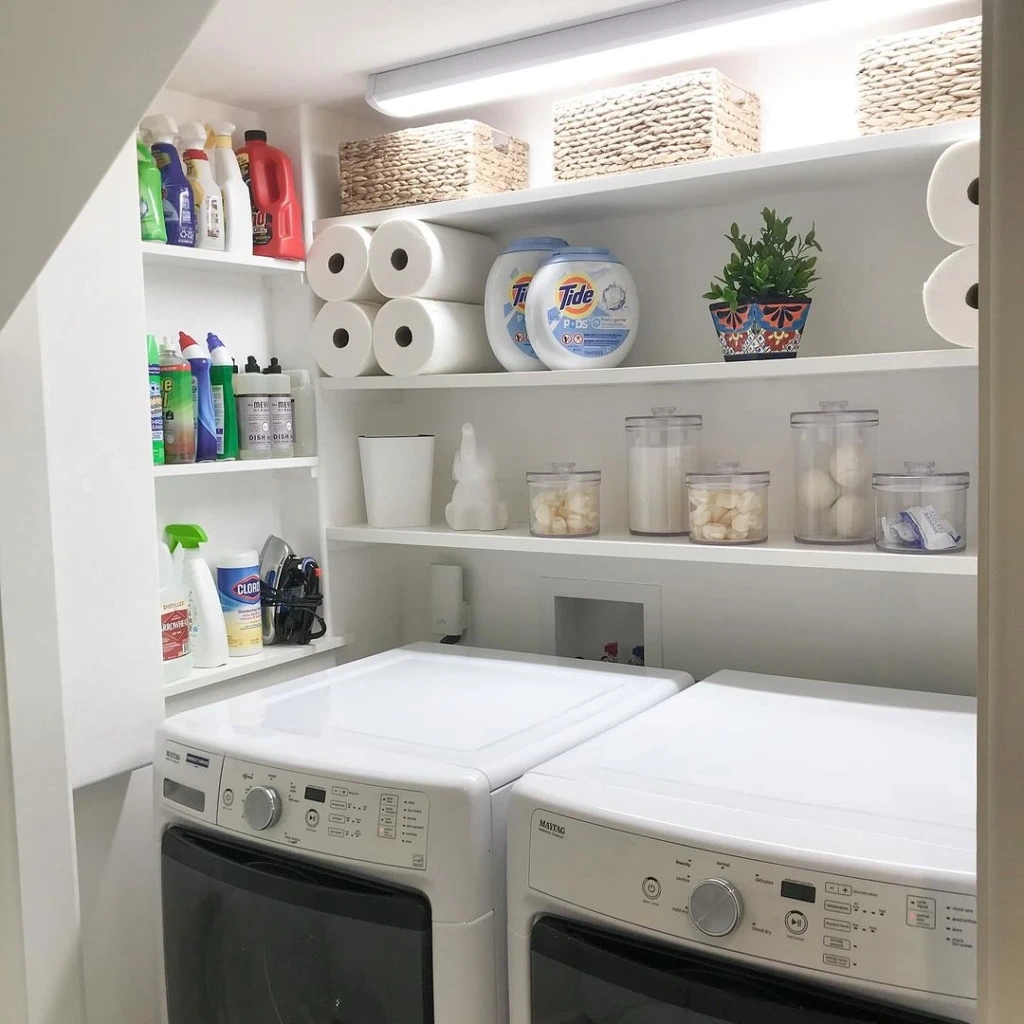 21. Under-Stair Laundry Closet with Floor-to-Ceiling Open Shelving