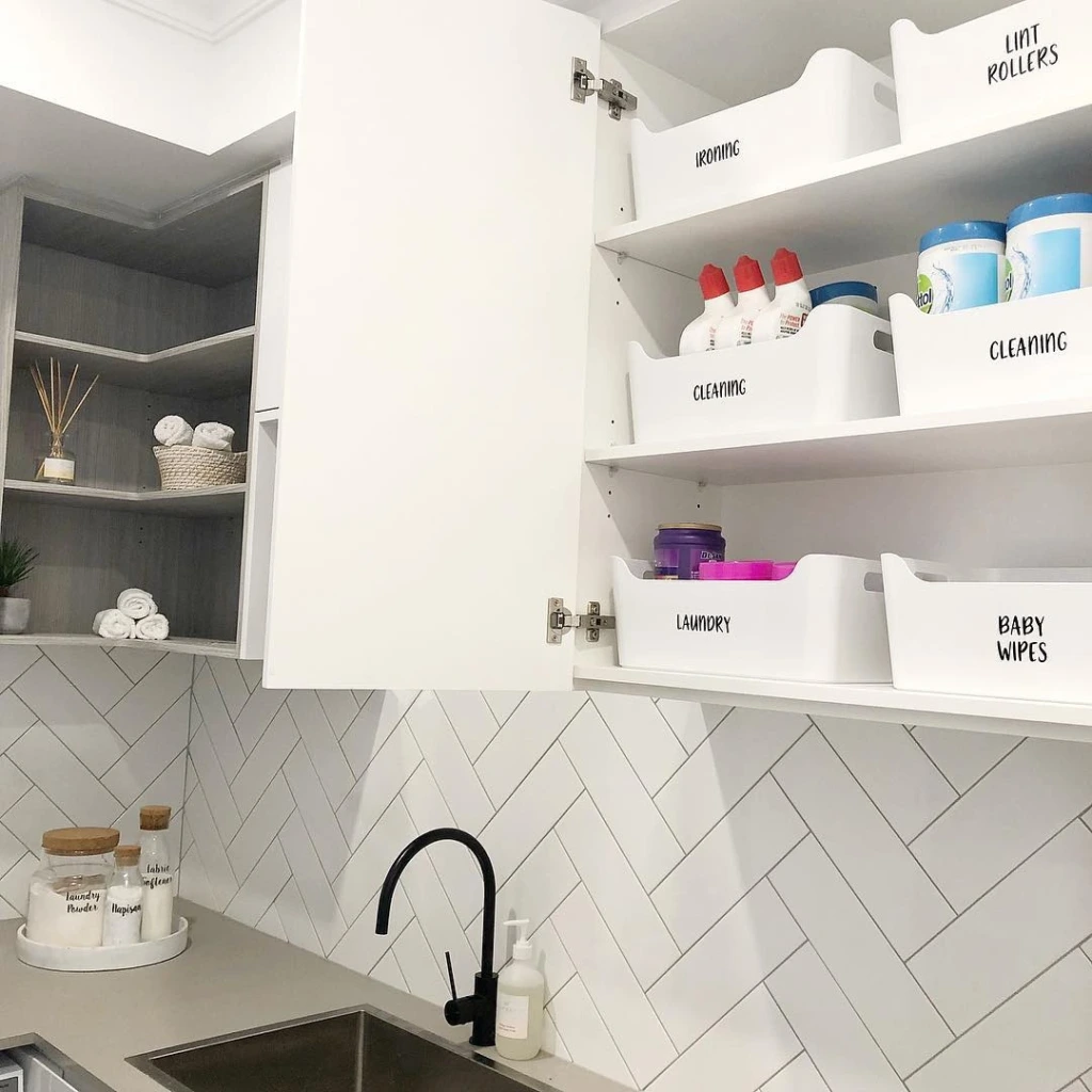25. Wall-Mounted Cabinet with Labeled White Bin System