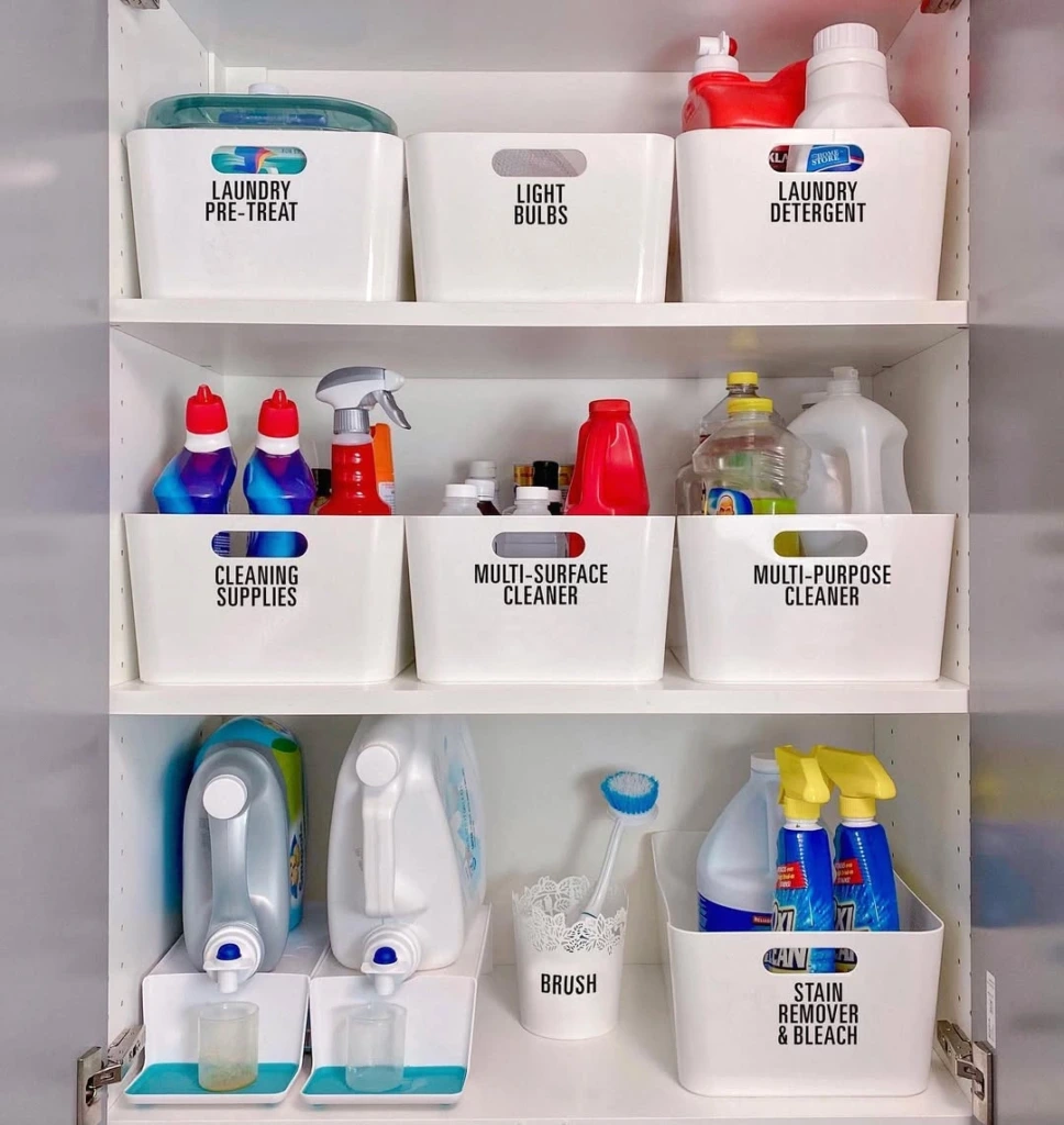 27. Custom Cabinet with Labeled Storage Bins for Every Category