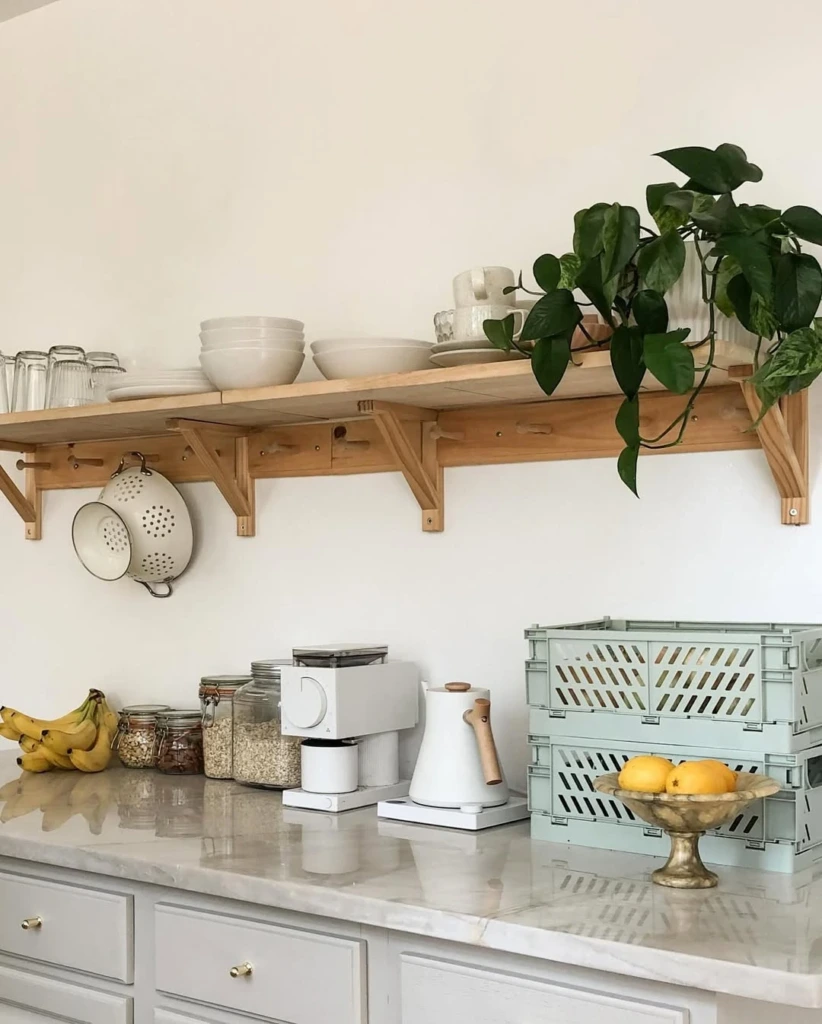 13. Minimal Open Shelf with Soft Green Accents