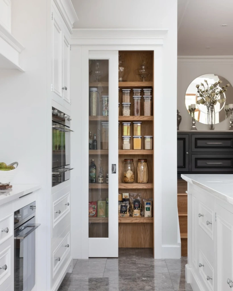 3. Glass-Door Pantry Elegance