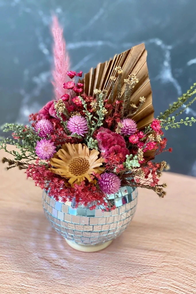 20. Natural Floral Centerpiece with Disco Balls