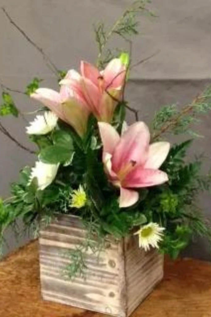 30. Rustic Wooden Crate with Flowers