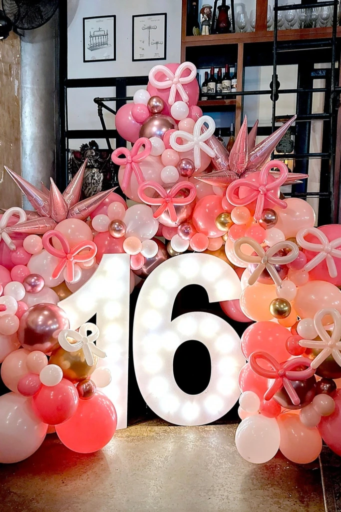 Pink Balloon Arch with Marquee Numbers