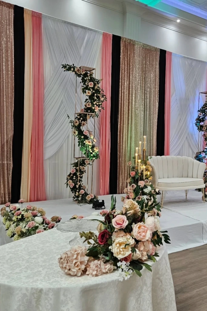 Elegant Draped Stage with Floral Accents